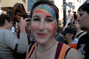 Rainbow-faced woman at Dyke March in San Francisco 2009