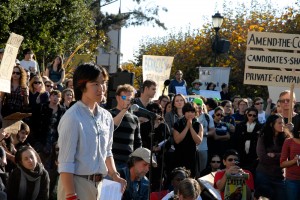 Speaker before the march at Occupy Cal Strike at Sproul Plaza