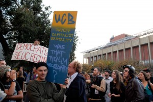 Unjust Capitalist Brutality sign at Sproul Plaza during OccupyCal Strike